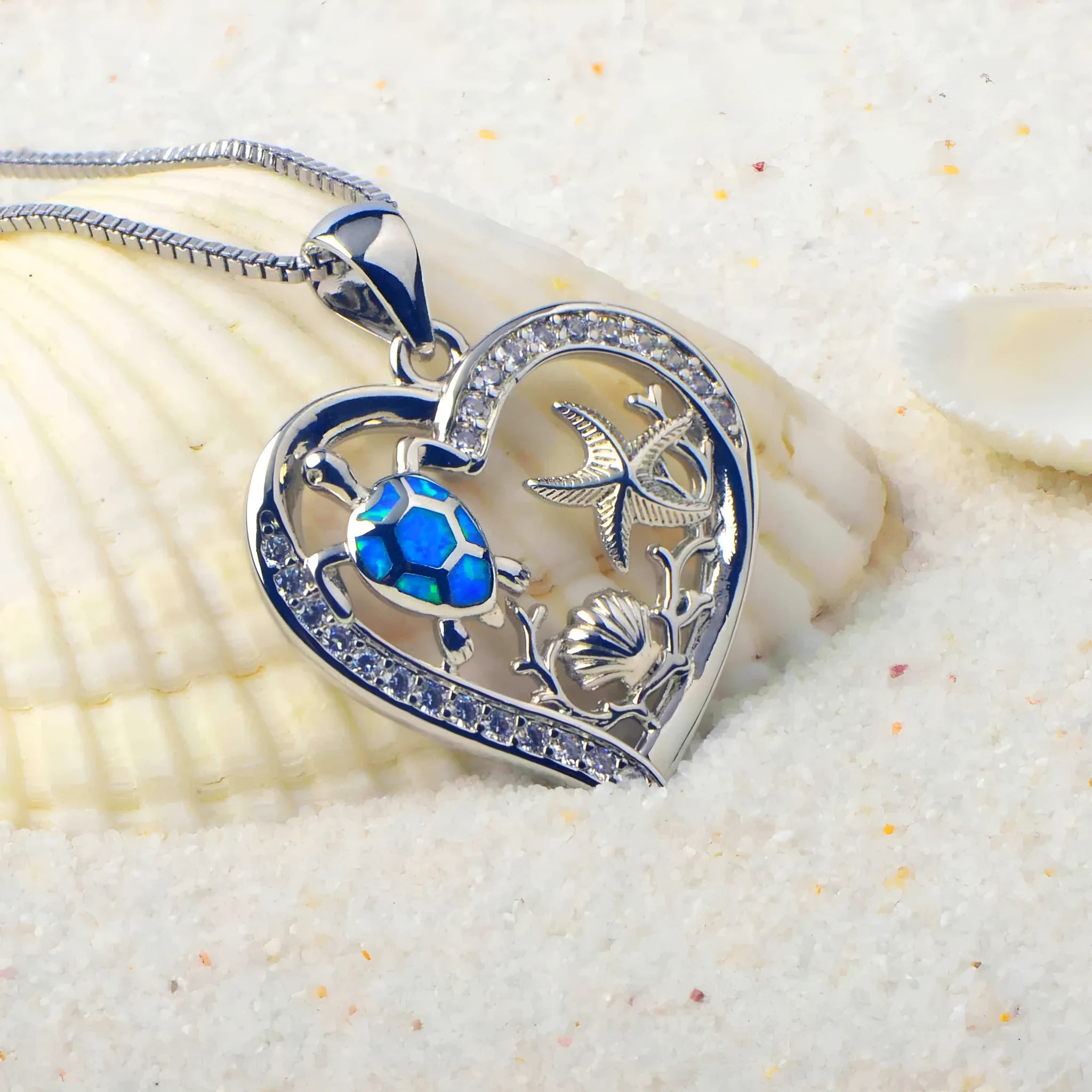 Blue synthetic opal turtle love pendant on copper electroplated base