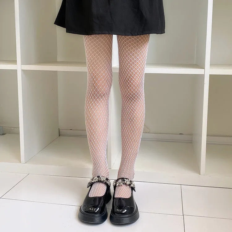 Women's black and white mesh stockings showing large, medium, and small net patterns.