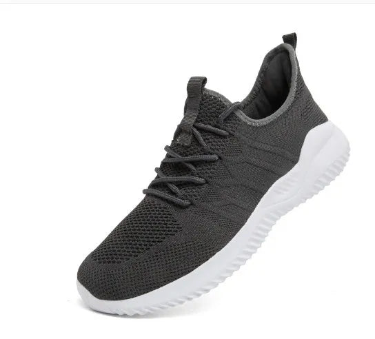 Men's black and white mesh sport sneakers with round toe and lace-up closure