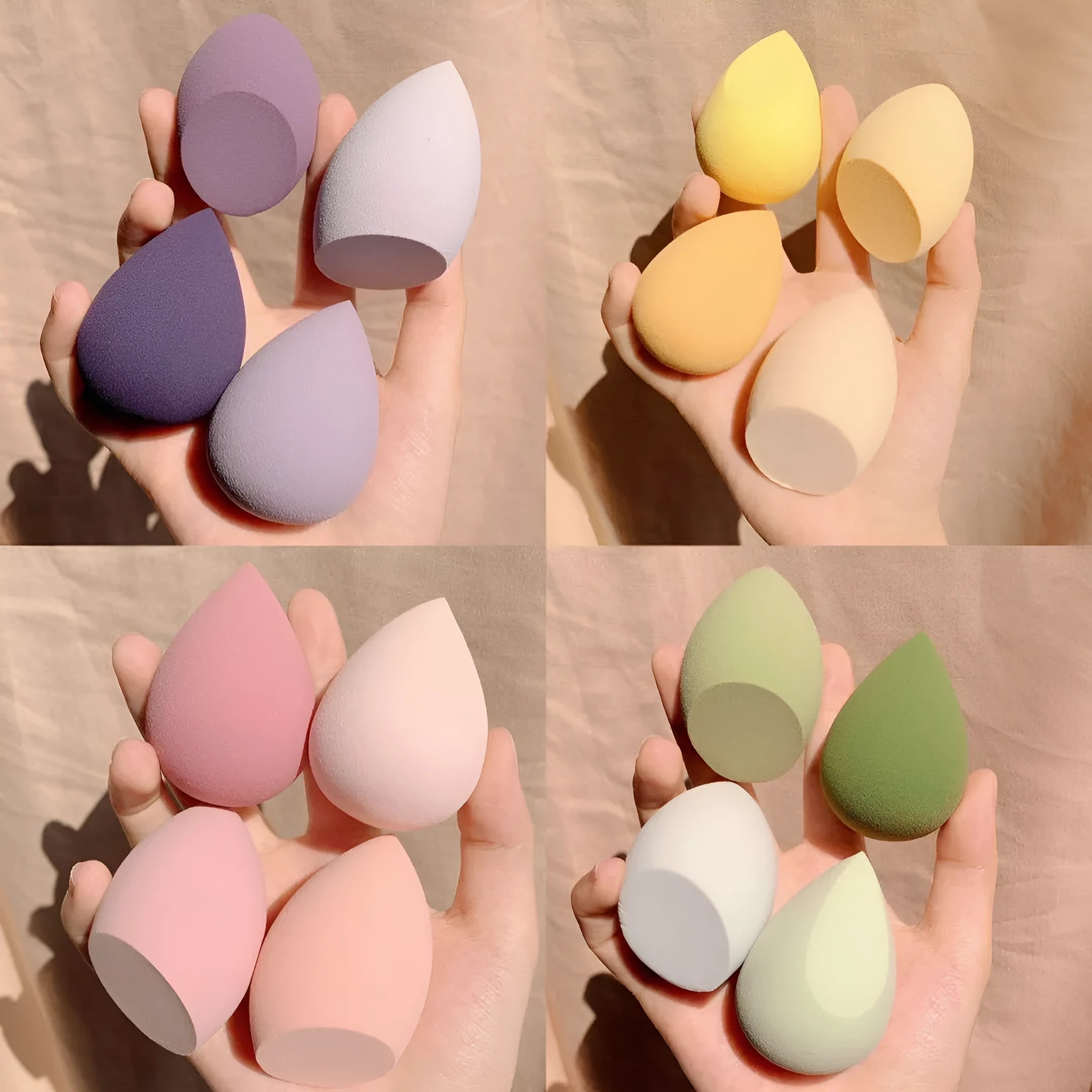Set of four coloured makeup sponge eggs on a pink background