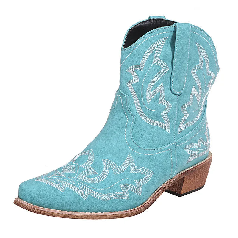 Blue embroidered women's cowgirl boots with a low wedge heel and pointed toe.