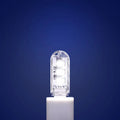 Small white USB-powered LED baby night light showing dual white and warm light options