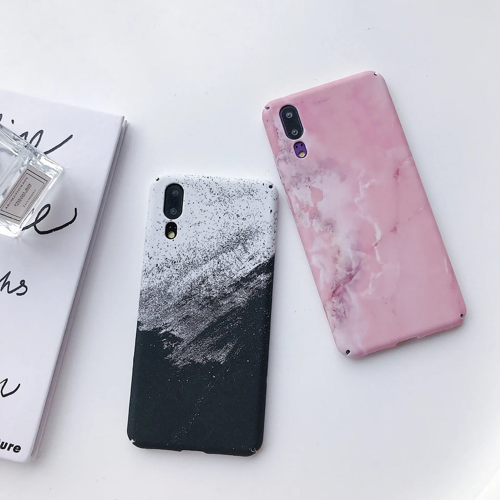 Painted solid colour phone case for Honor and Huawei smartphones in black or pink.