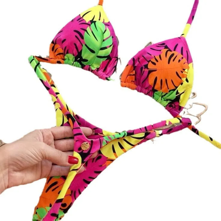 Women's printed lace-up split bikini set in nylon, available in six prints and sizes S, M, L.