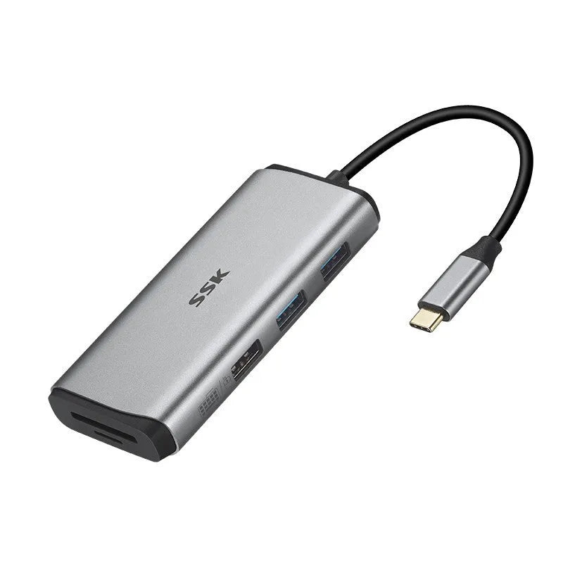 Grey 11-in-1 USB-C hub adapter with HDMI, VGA, Ethernet, USB ports, and a short connecting cable
