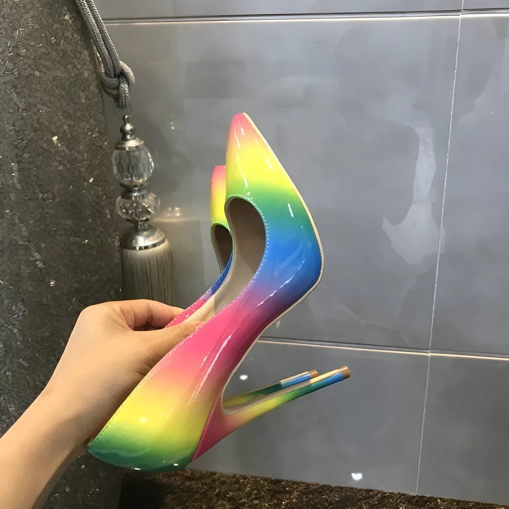 Rainbow patent leather pointed toe stiletto high heel shoe with thin heel.