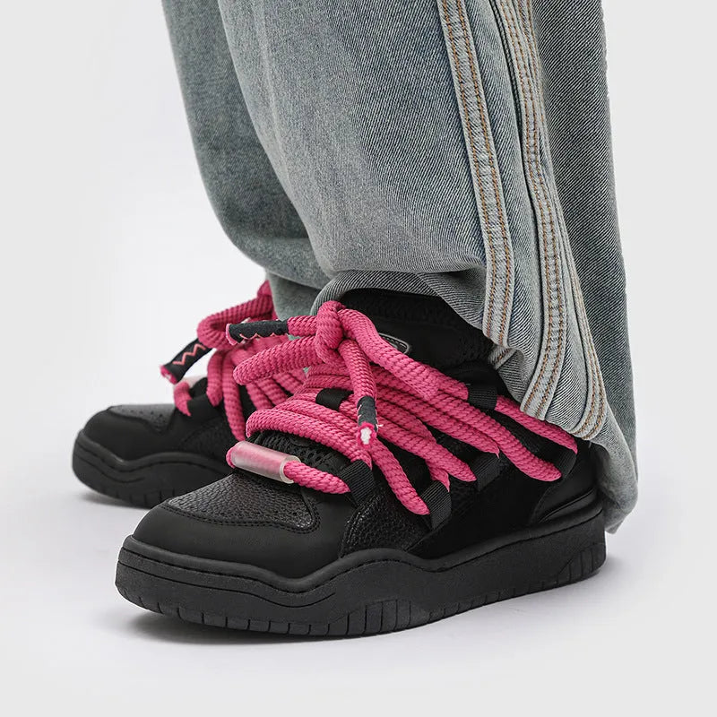 Casual lace-up trainers with thick rubber sole and mesh detailing in denim blue colour.