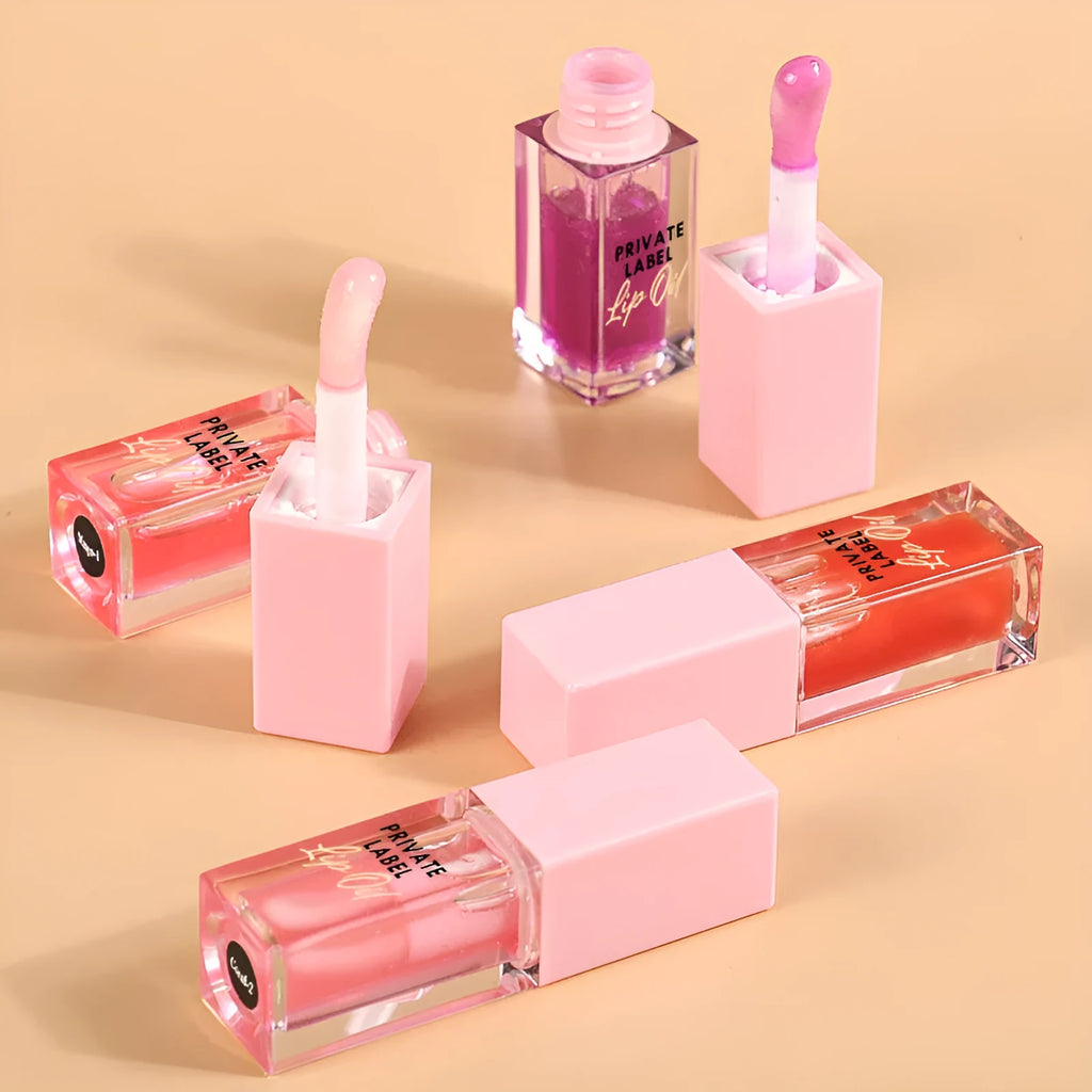 Women's transparent lip gloss tube in six fruity flavours: Bird of Paradise, Cherry, Coral, Mango, Strawberry, Watermelon