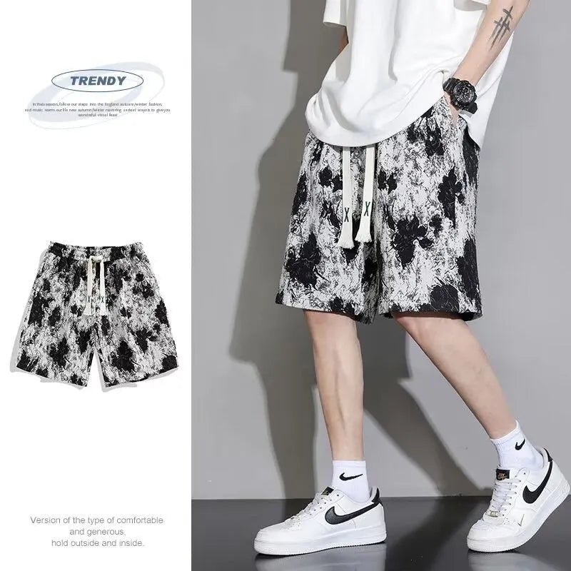 Men's polyester summer shorts in fifth pants length, showing colour options and size range