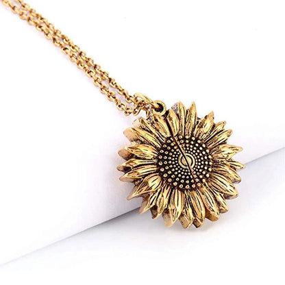 A stunning sunflower pendant necklace with an adjustable chain in various fashionable colors