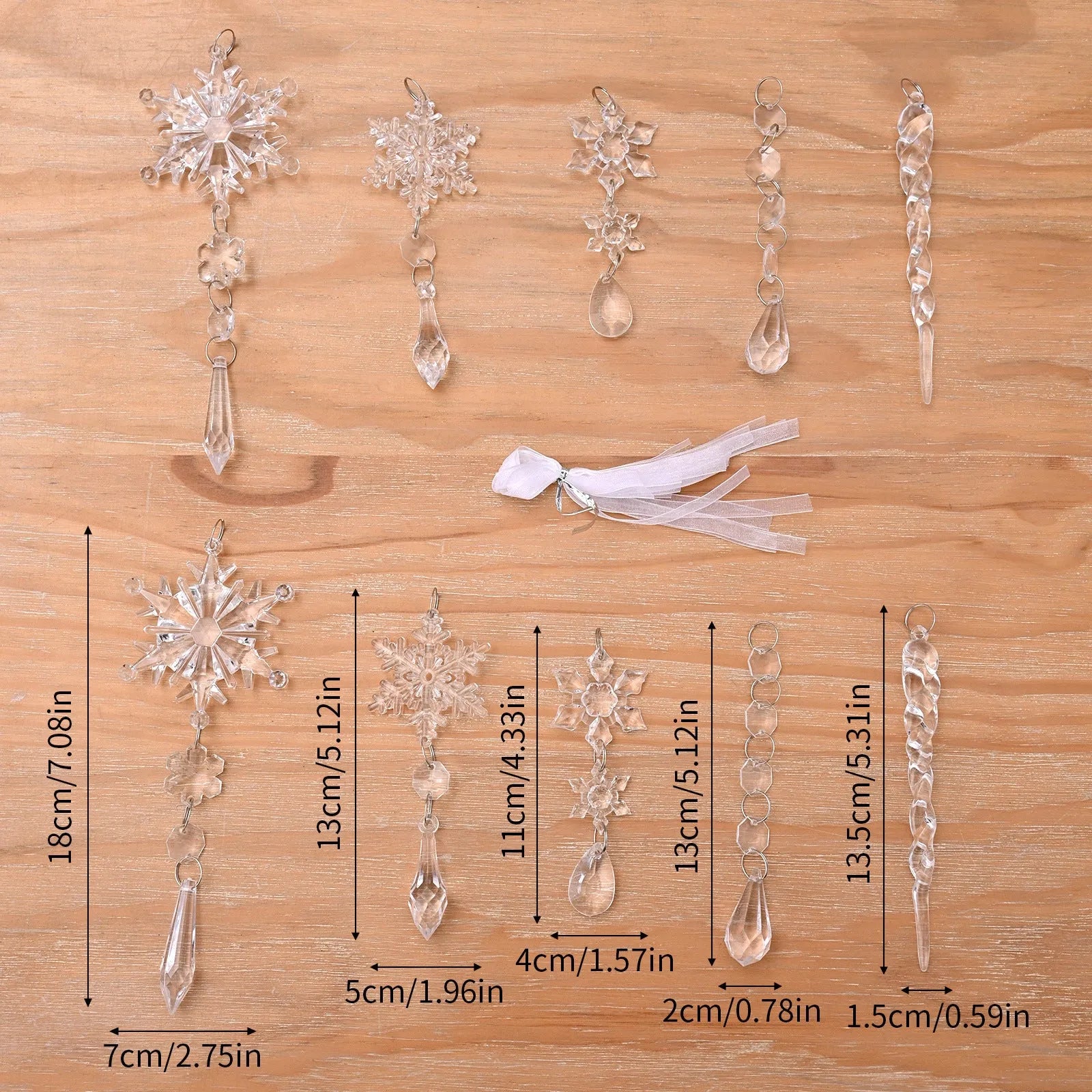 Set of 10 transparent acrylic icicle and snowflake Christmas tree hanging ornaments with ribbons.