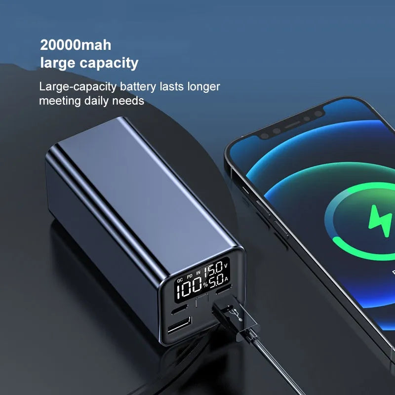 65W metal laptop power bank in black, blue, or grey colours showing size next to a laptop.