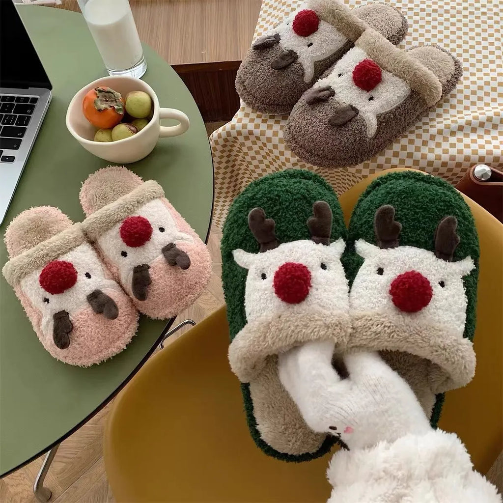 Women's Christmas elk plush slippers with decorative antlers and non-slip PVC soles in brown, green, and pink colours