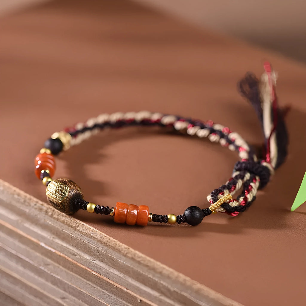 Close-up of a hand-woven flexible wire bracelet for women with a Lapis Lazuli stone accent.