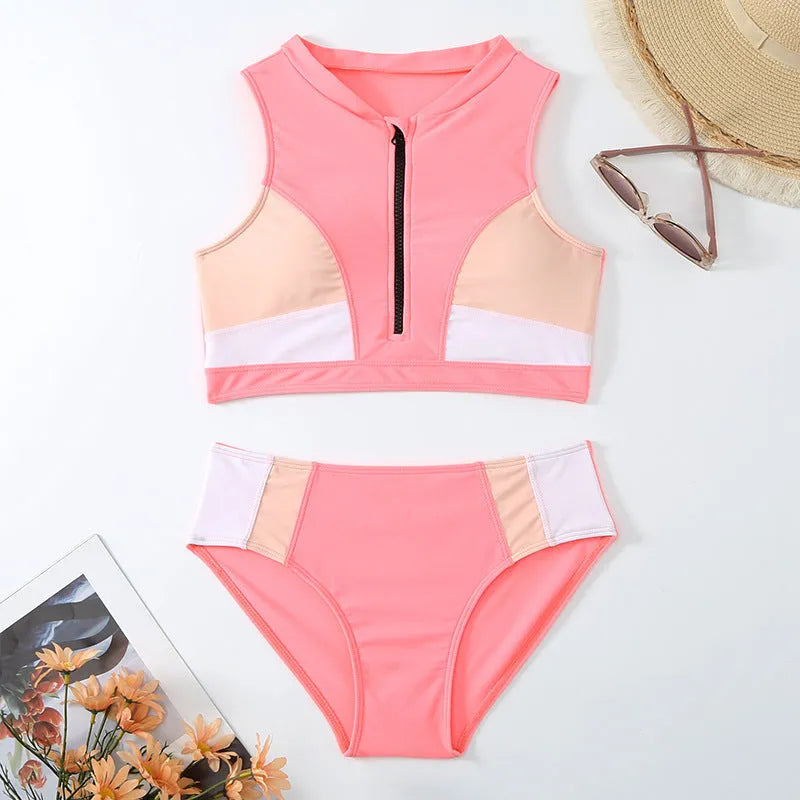 Pink high waist bikini swimsuit set with split design on a solid colour background.