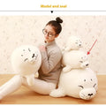 White sea lion plush toy with short plush fabric and PP cotton filling on display