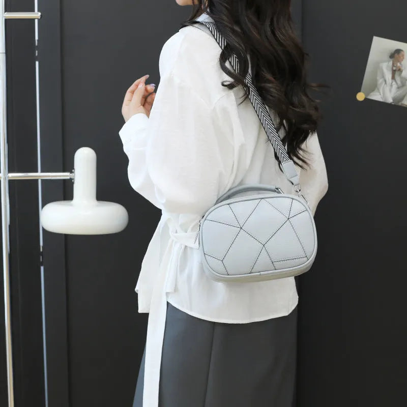 Round grey PU leather patchwork small bag with decorative stitching, shown next to a tape measure indicating 20x15 cm size.