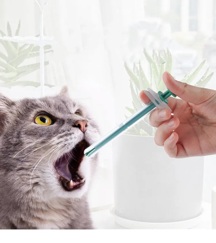 Two silicone pet pill shooters with soft tips for administering tablets to cats and small dogs