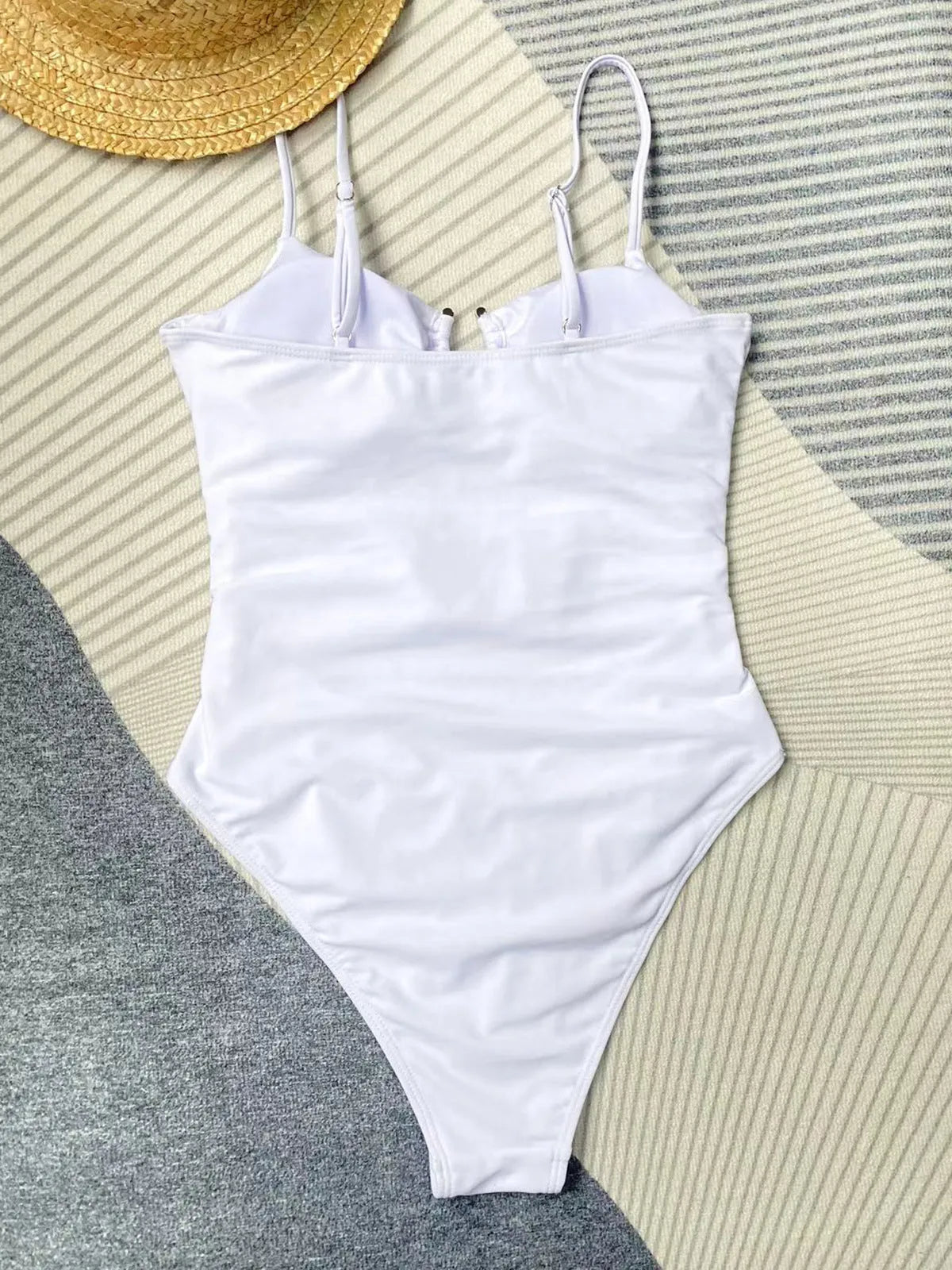 Black women's one-piece swimsuit with solid colour design and bikini style
