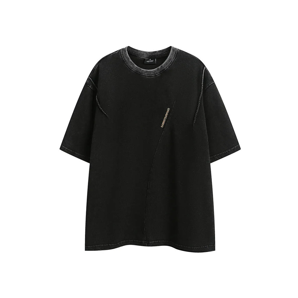 Purple and black washed cotton retro T-shirt with embroidery, shown in loose fit with half-length sleeves.
