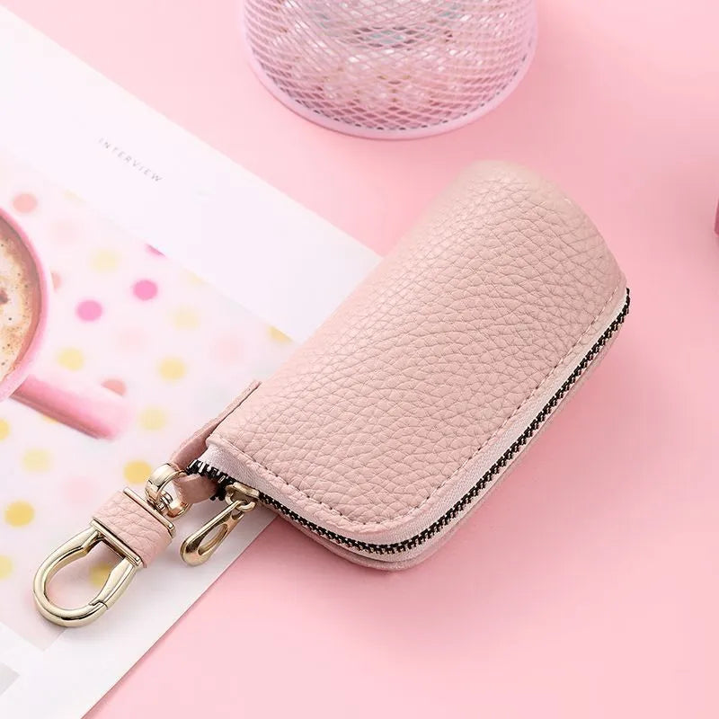 Waterproof PU key case with zipper closure in black, grey, or pink colours