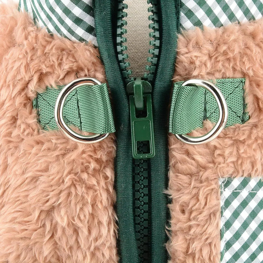 Green plush fleece dog jumpsuit coat with a back zipper on a small dog