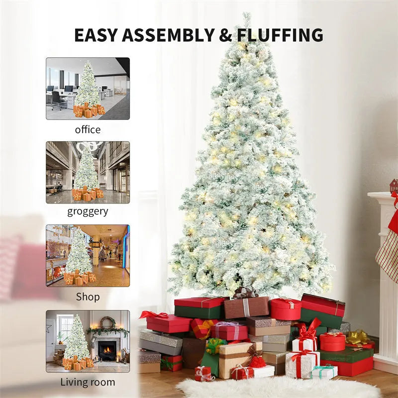 Green and white snow-dusted artificial PVC Christmas tree on a metal stand.
