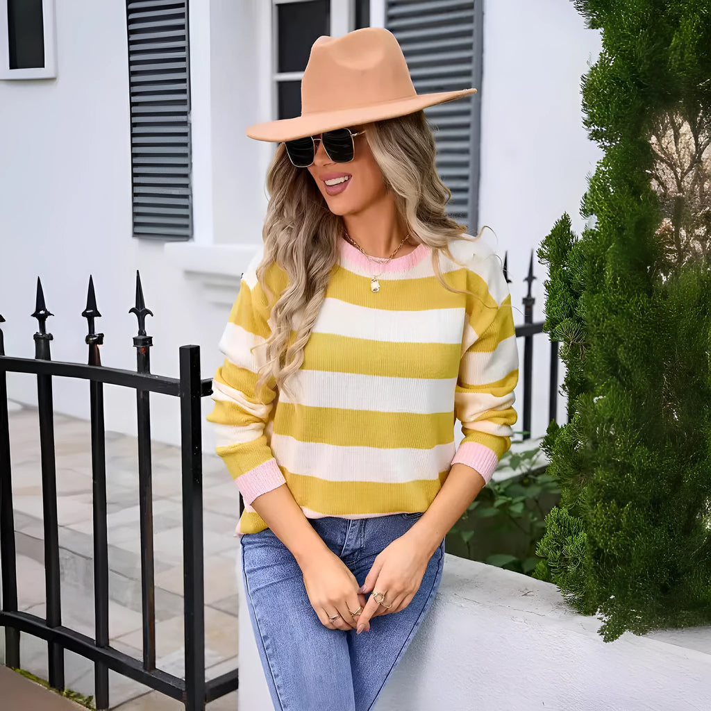 Women's loose long sleeve acrylic sweater in blue with a stripe pattern