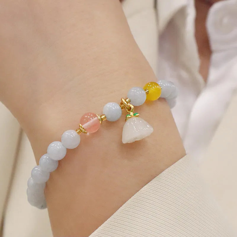 Women's handmade artificial crystal bracelet with gold-plated chain and charm pendant