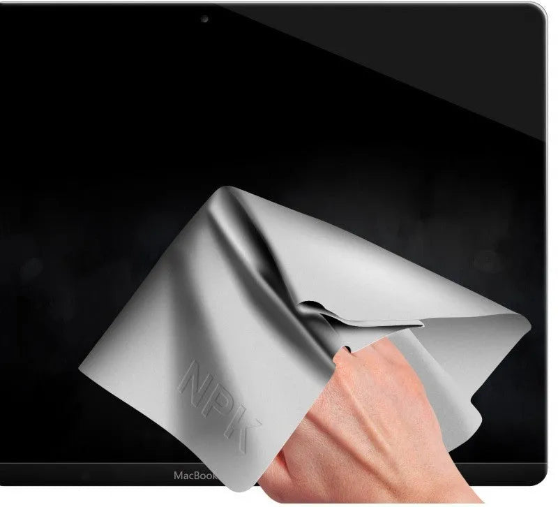 Grey keyboard dust cloth placed over a laptop keyboard for dust protection