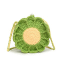 Hand-woven wool bag with crocheted flowers and round suitcase shape