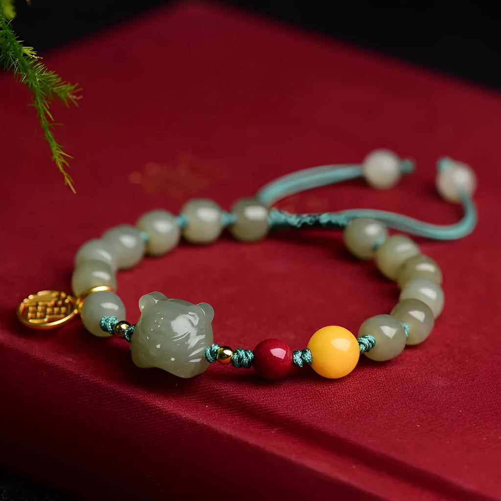 Natural Hetian jade and cinnabar beeswax bead bracelet with 5x7mm beads and Zodiac motifs