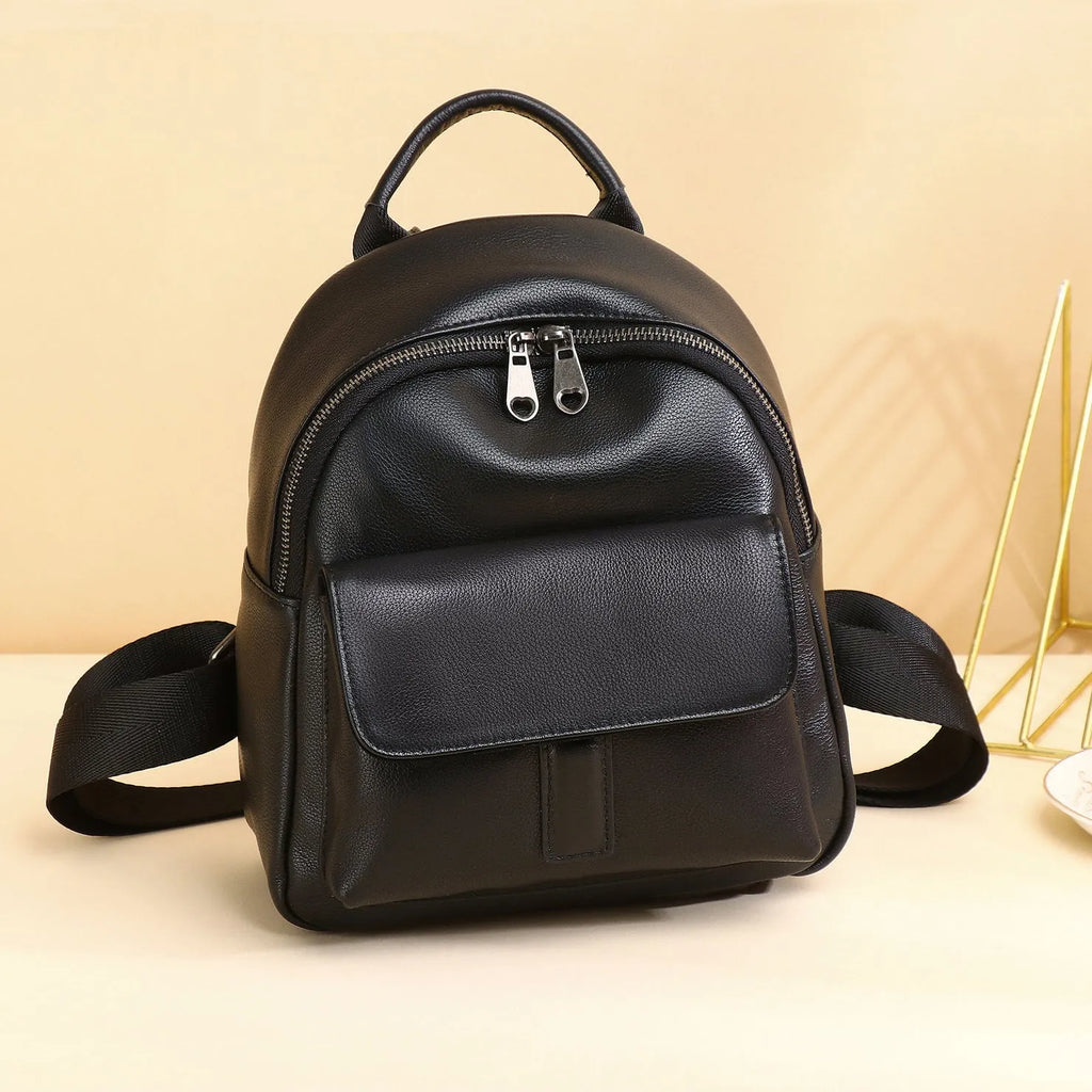 First layer cowhide leather women backpack in compact 24x20x10cm size, available in black, brown, or coffee