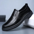 Men's black casual leather shoes with non-slip soft sole and round toe on a white background
