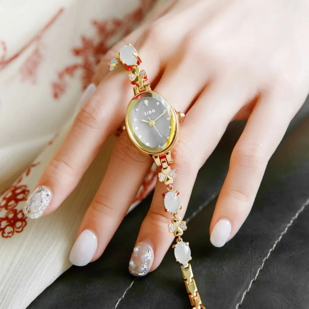Women's quartz wrist watch with diamond accents, slim 8mm case, available in multiple colours