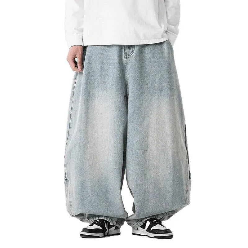 Men's plus size wide leg jeans in denim fabric with straight leg openings and low waist design