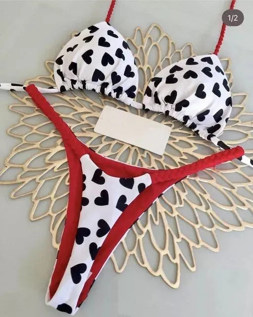 Women's printed lace-up split bikini set in nylon, available in six prints and sizes S, M, L.