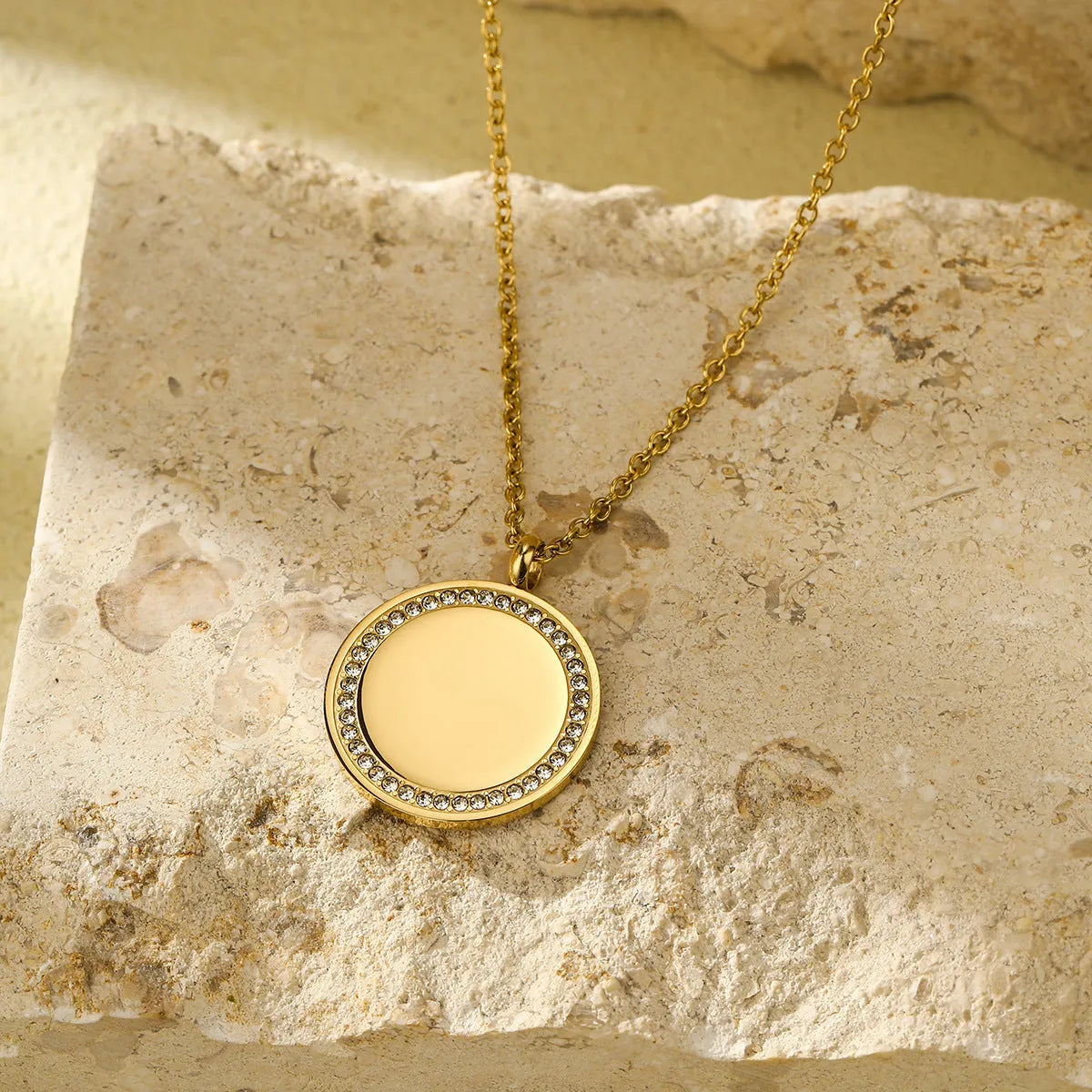 Geometric diamond inlaid titanium steel necklace with 18K gold electroplated finish, adjustable chain 41-50cm, round pendant