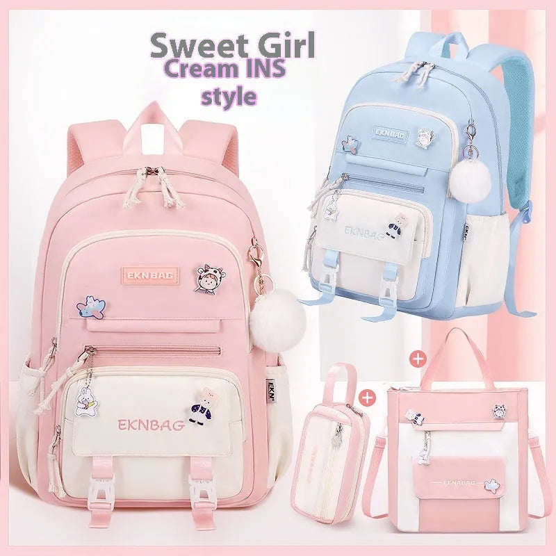 Waterproof pink school backpack for girls with curved straps and a matching pencil case.