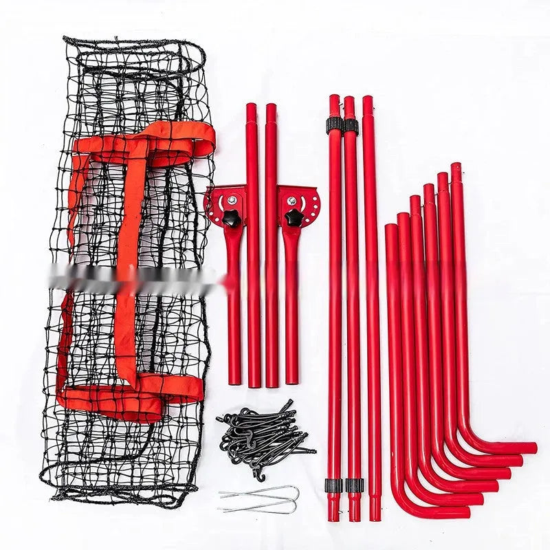 Red metal-frame portable baseball training net set up in a garden, measuring 4 feet wide by 6 feet high.