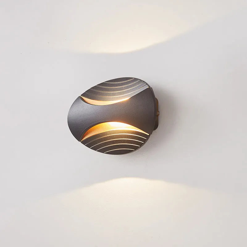 Modern minimalist aluminium bedside wall lamp showing three light colour options