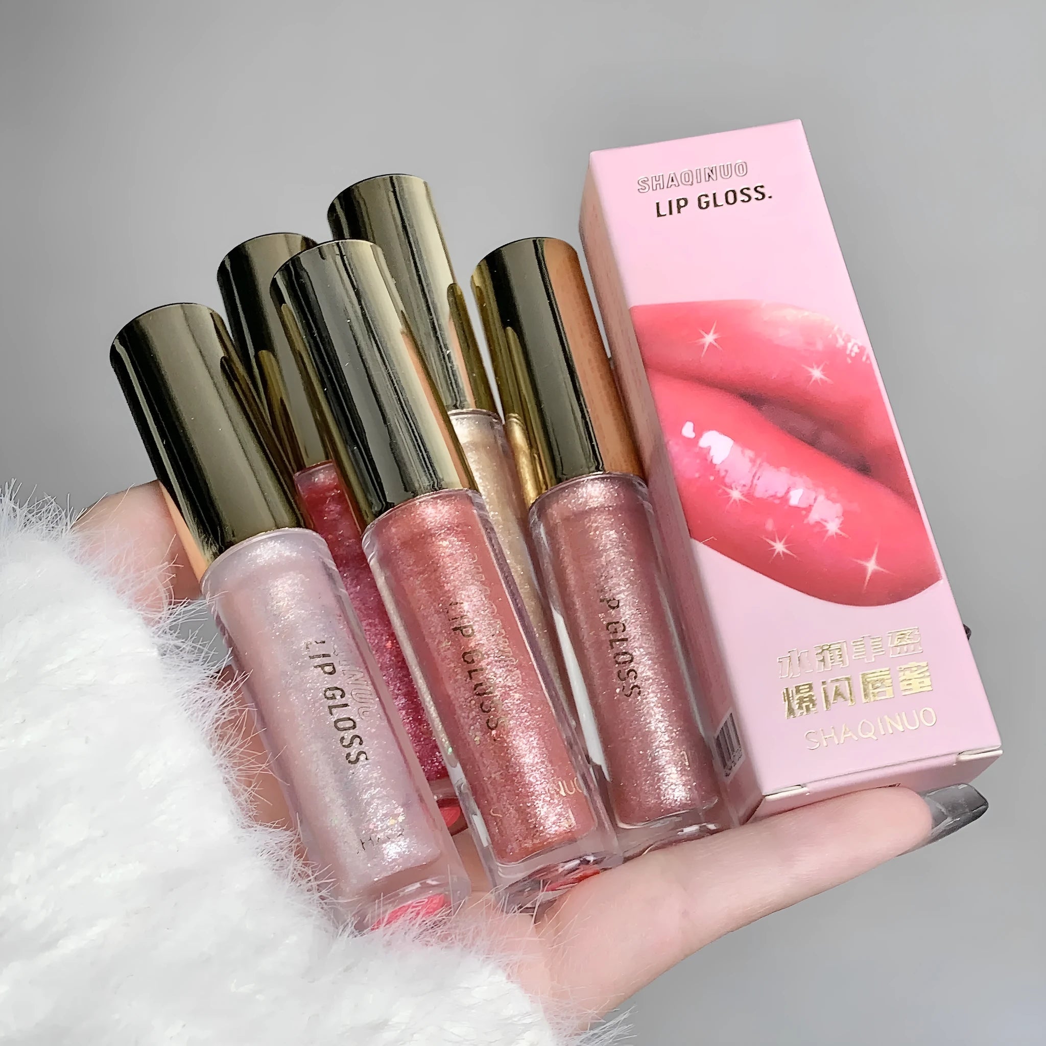 Shanuo Flash Lip Gloss in five colours: cherry blossom pink, gold flash, peach, purple, and berry red.
