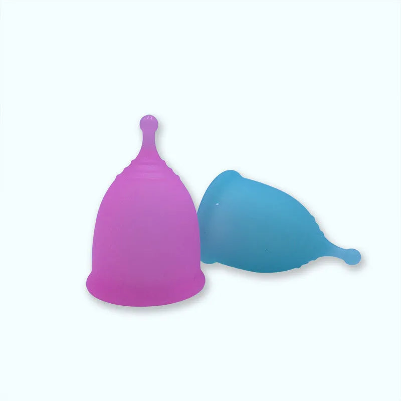 Medical grade silicone menstrual cup in black, blue, pink, purple or transparent, sizes S 42mm and L 46mm, top type shape.