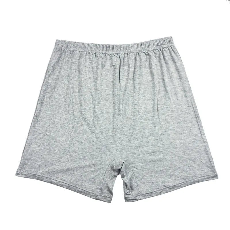 Men's solid colour high-waist boxer shorts in modal fabric on a grey background.