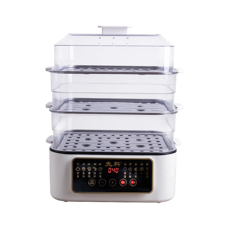 Stainless steel electric food steamer with digital display and steaming rack on a kitchen counter.