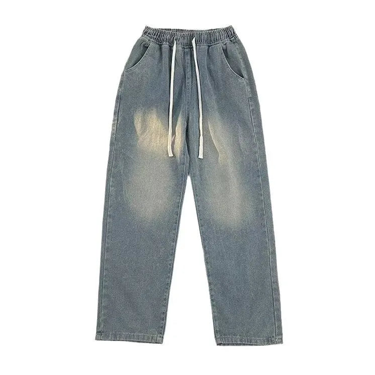 Men's loose fit straight leg denim trousers in blue and black with drawstring waist closure