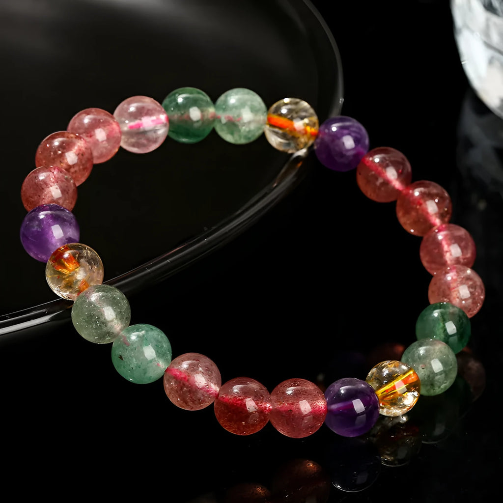 Natural tourmaline colour strawberry quartz bracelet with round geometric beads.