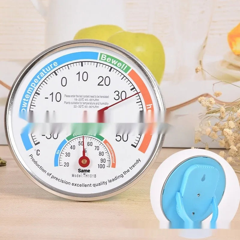 Plastic indoor thermometer with black pointer and back shell for humidity measurement