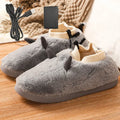 USB electric heating slippers in soft velvet, showing adjustable temperature control and USB cable connection.