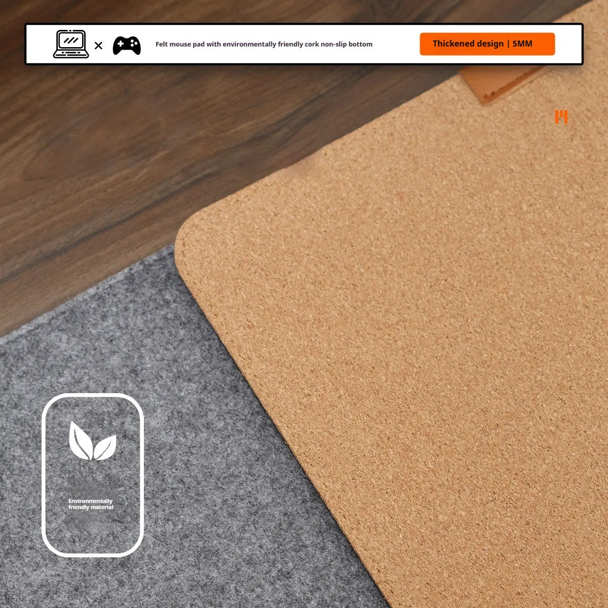 A grey and black felt cork desk mat with a mouse on it, shown on a wooden desk.
